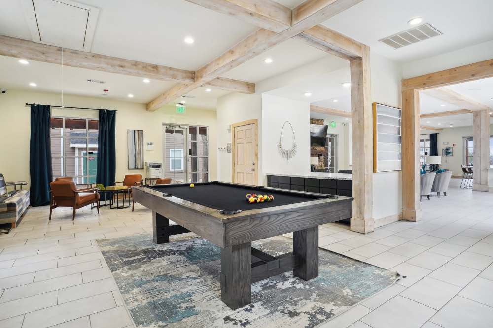 Billiard lounge with nice pool table at Flatiron District at Austin Ranch in The Colony, Texas