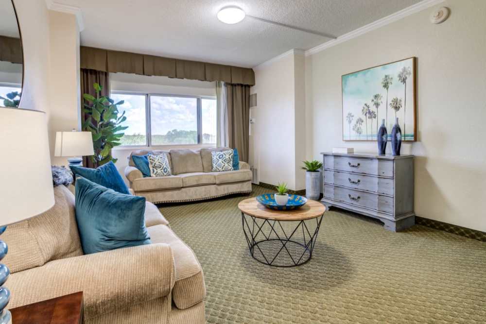Living room with plank flooring at Grand Villa of Ocala in Ocala, Florida