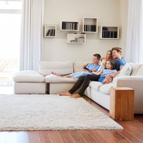 A happy family setting in living room at Challenger Estates in Patuxent River, Maryland