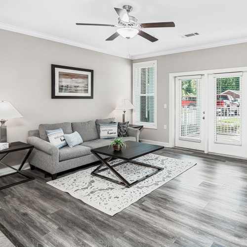 Specious living room with wooden flooring at Groves at Waters Edge in Waynesville, North Carolina