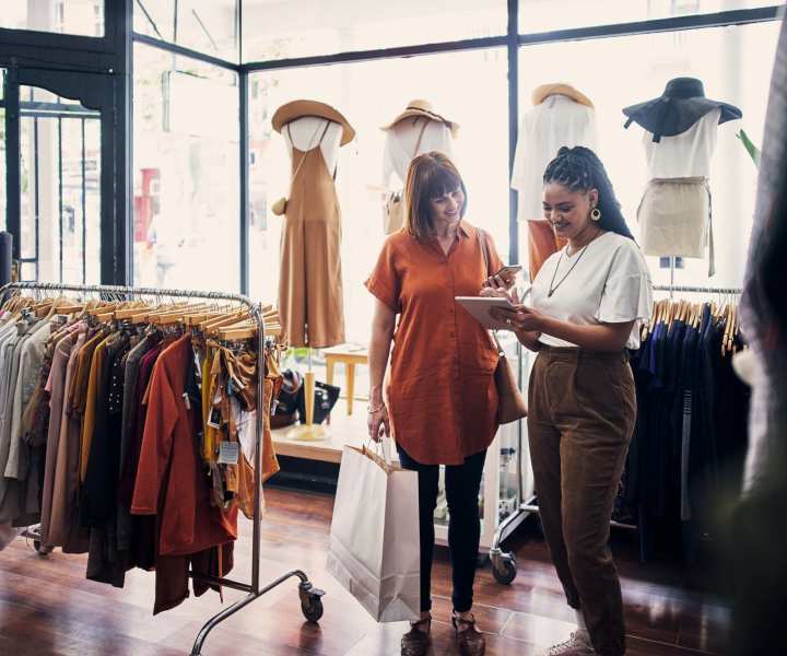 Resident shopping at a clothing boutique near Meridian Oaks in Tallahassee, Florida
