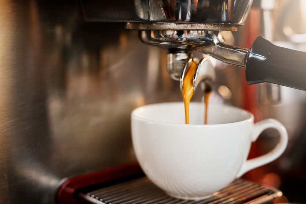 A coffee cup filling with espresso at Applewood Pointe Prior Lake in Prior Lake, Minnesota.