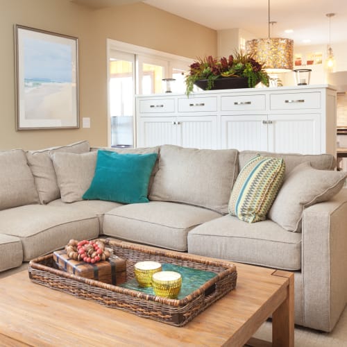 A well-lit living room in a home at El Centro New Fund Housing (Officers) in El Centro, California