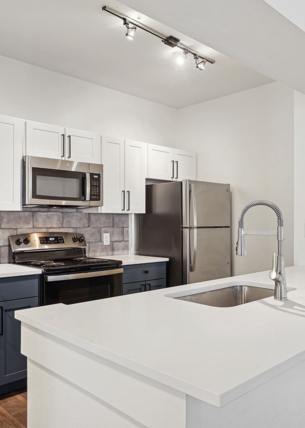 Spacious iskand kitchen at Mission Eagle Pointe in Allen,Texas