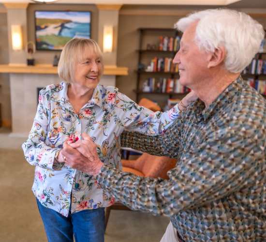 Resident dancing at Merrill Gardens at Auburn in Auburn, Washington