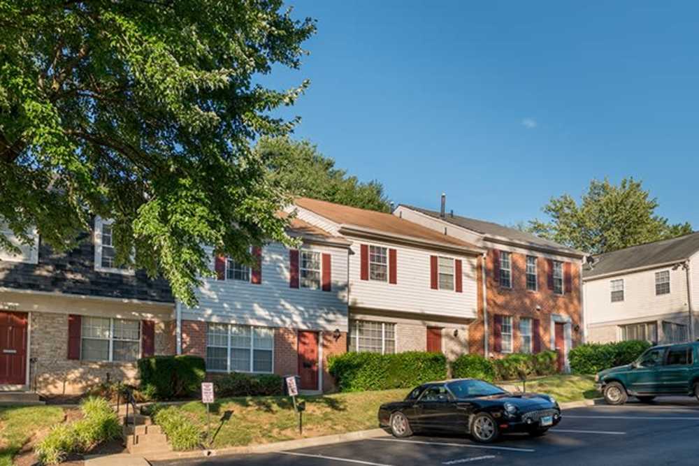 Exterior view of apartments with car parking at Scarborough Square in Rockville, Maryland