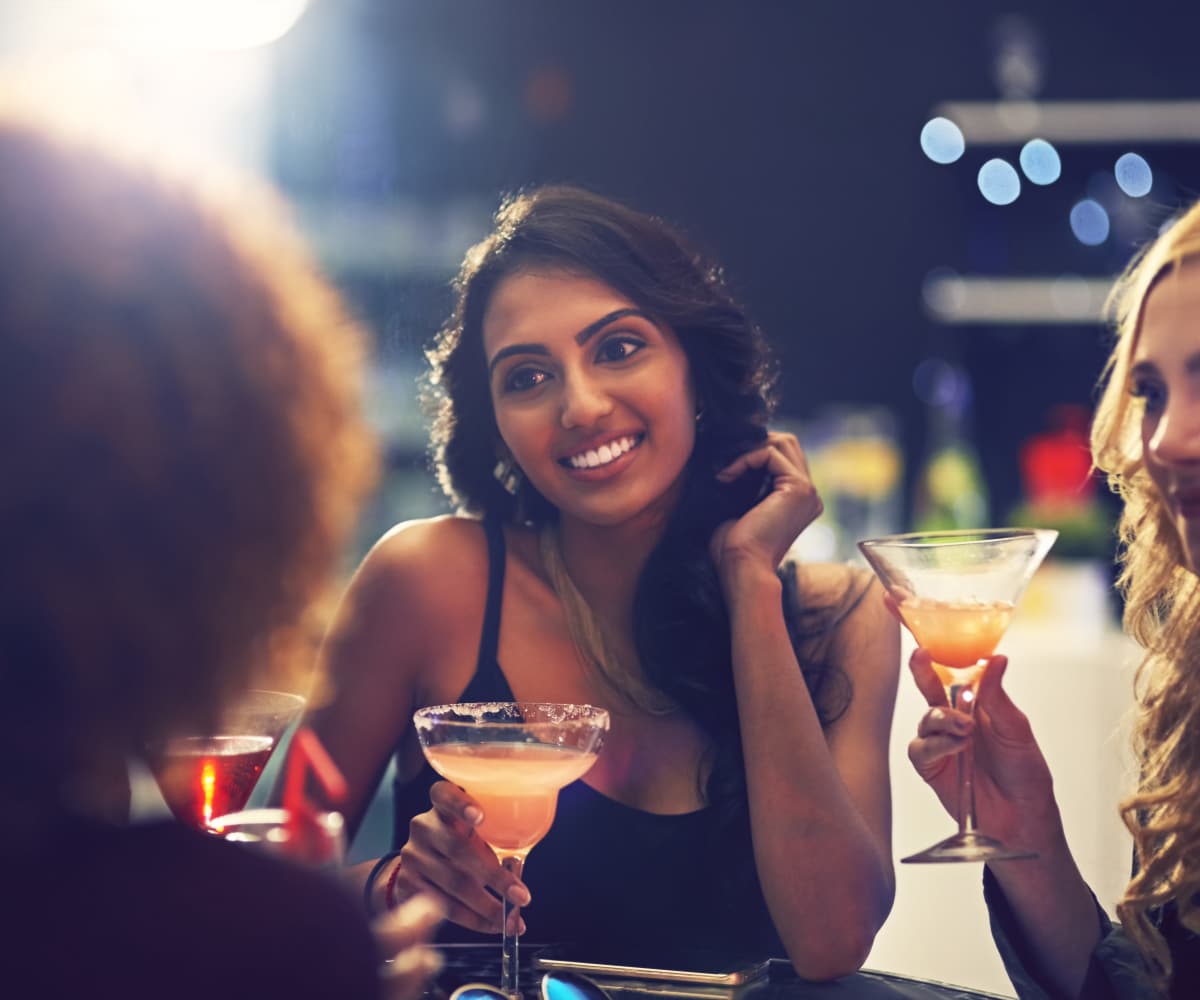 Residents out enjoying a drink together near Sugarberry Apartments in Tulsa, Oklahoma