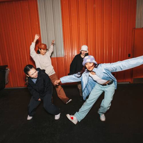 Friends dancing on a night out at 1801L Apartments in Sacramento, California
