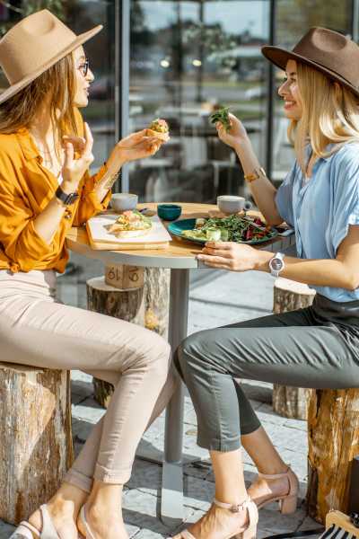 Women enjoying some coffee at a cool cafe near Jade at North Hyde Park in Tampa, Florida