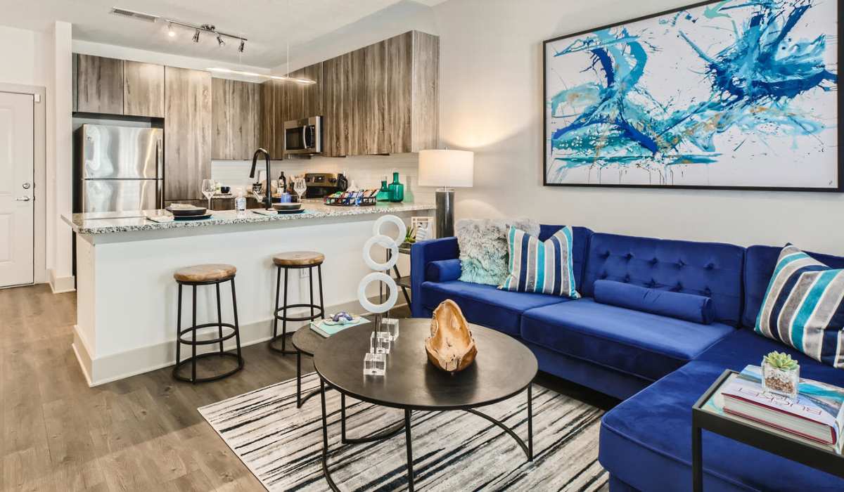 Living room and kitchen at Soba Apartments in Jacksonville, Florida