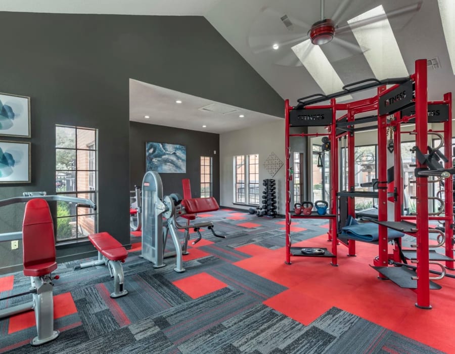 Well equipped and spacious fitness center at The Brandt in Irving, Texas