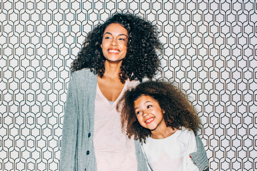 Resident mother and daughter posing for a photo at Sofi Berryessa in San Jose, California