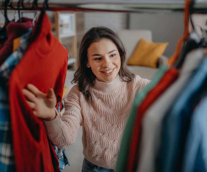 Woman in her private closet at Devonwood Apartments in Fayetteville, North Carolina