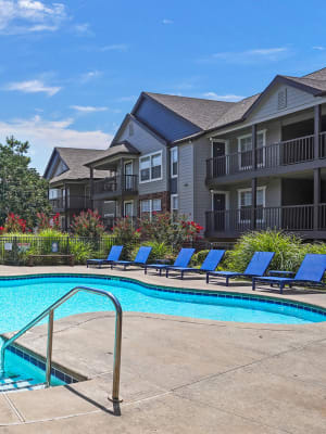 Deck and pool seating at Nickel Creek Apartments in Tulsa, Oklahoma