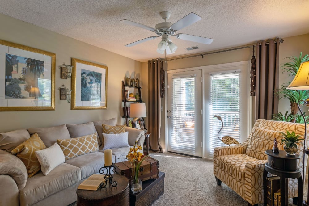 Well-furnished living space in an open-concept model home at Palmetto Pointe in Myrtle Beach, South Carolina