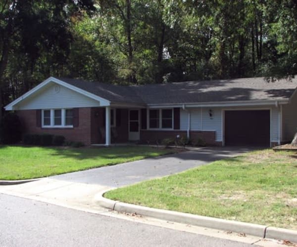 Exterior of a home with a garage at Kiskiak Village in Newport News, Virginia