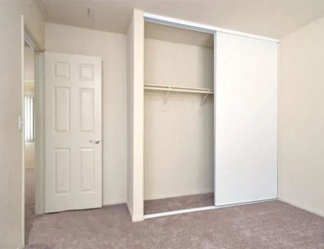 Unfurnished bedroom with closet at Casa Bella in Victorville, California