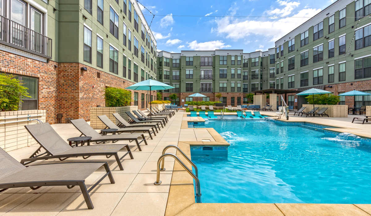 Resort-style pool with lounge chairs at 1400 Chestnut, Chattanooga, Tennessee