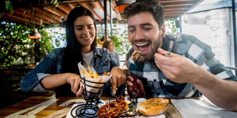 Residents eating near Miramar Townhomes in San Diego, California