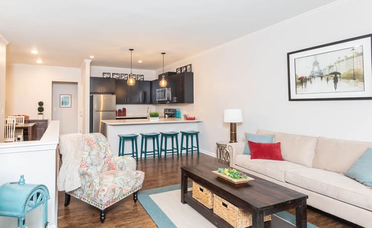 Spacious living room at North Ponds Apartments home in Webster, New York