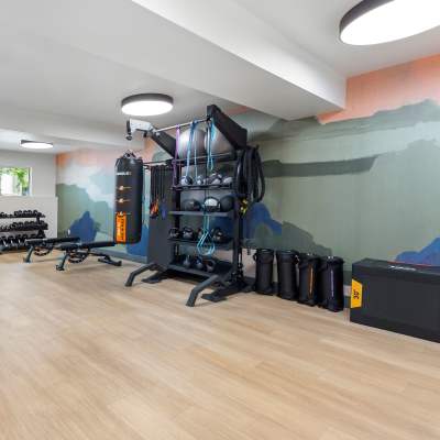 Spacious fitness center with various workout equipment at The Villas at Woodland Hills in Woodland Hills, California