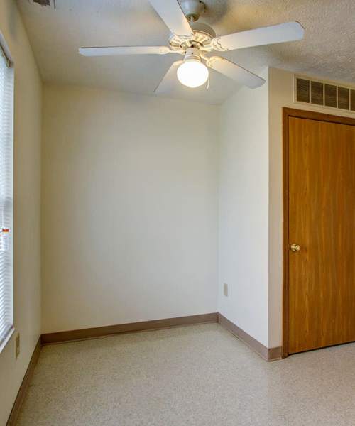 Ceiling fan with light in empty room at Wellington Place in Ottawa, Ohio