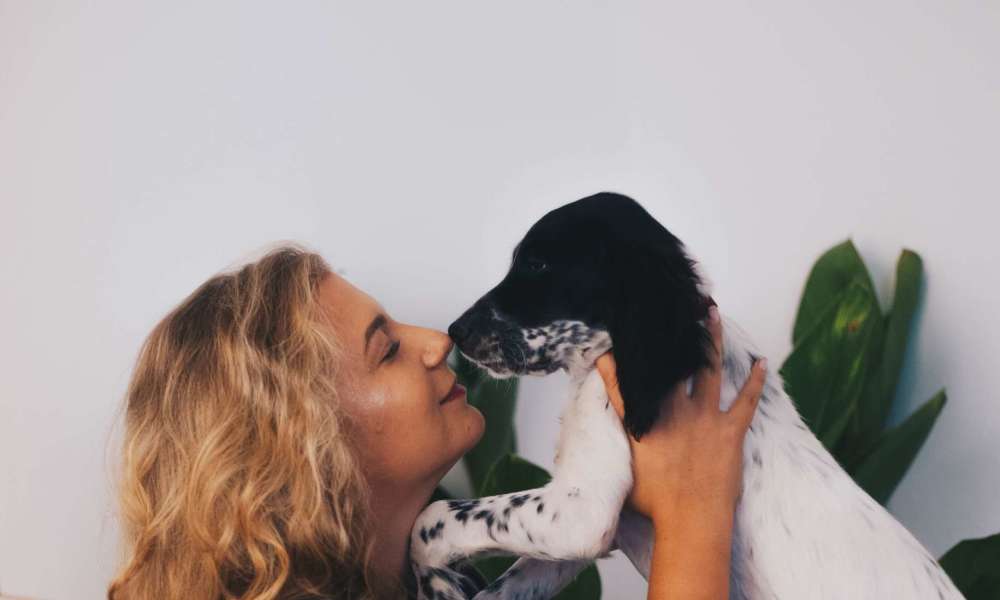 Resident with her dog at Belmont Glen Residences in Belmont, California