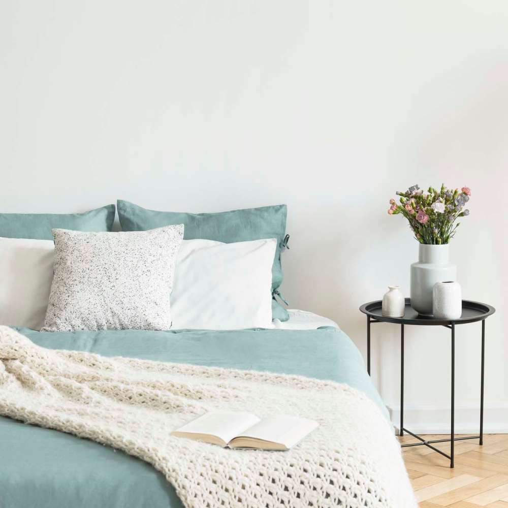 Bedroom with cozy bed and large window at 570 Washington in New York, New York