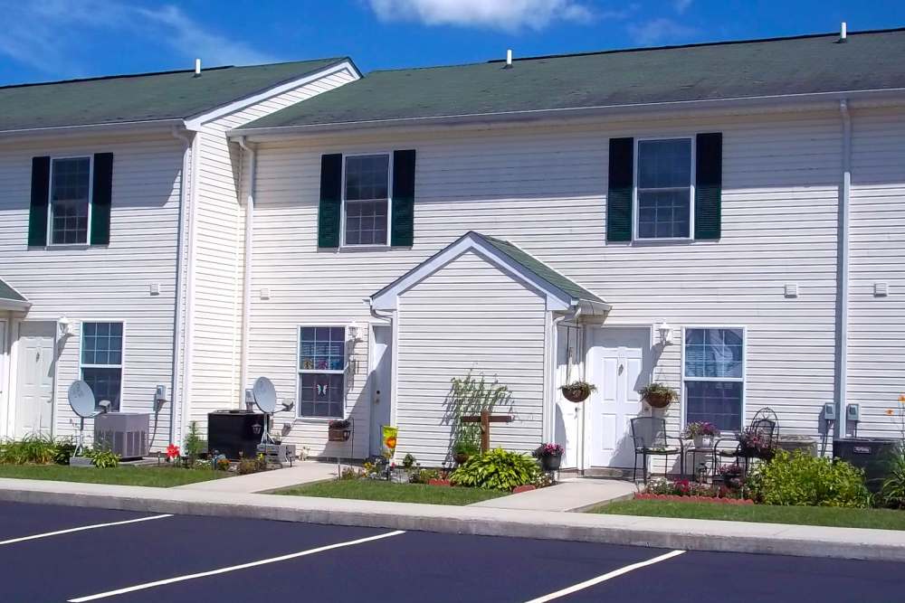 View of building with car parking at Yellowbud Place in Moorefield. WV