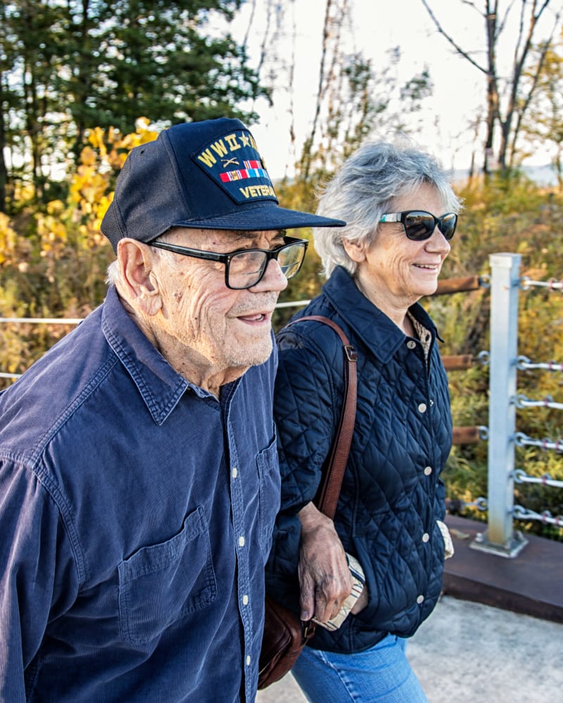 Resident walking with their partner at Randall Residence at Encore Village in Brighton, Michigan