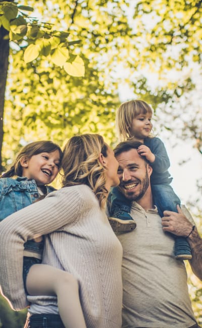 Family enjoying the outdoors near The Fairway Apartments in Salem, Oregon