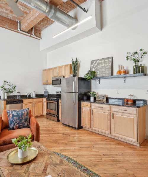 Modal open kitchen with hard wood flooring at 2001 East in Richmond, Virginia, 