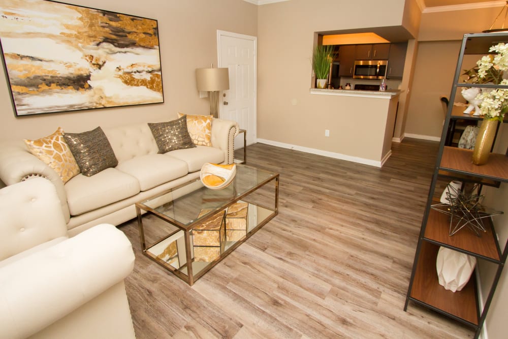 apartment living room and kitchen with bar at Veranda in Texas City, Texas