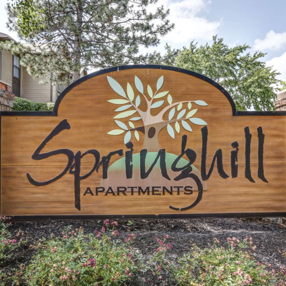 Springhill Apartments sign with beautiful landscaping at Springhill Apartments in Overland Park, Kansas 