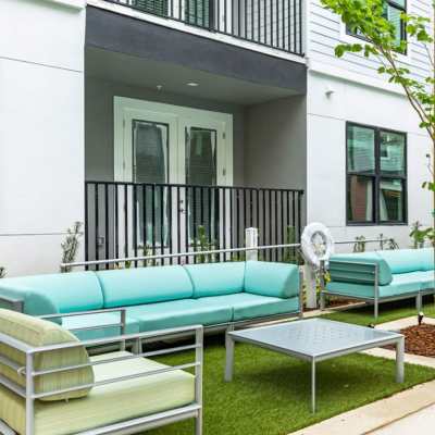 Clubhouse area with tons of areas to sit and relax in at Jade at North Hyde Park in Tampa, Florida