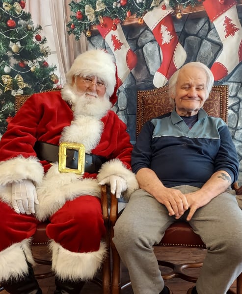 A River Park (TX) resident enjoys his time with Santa
