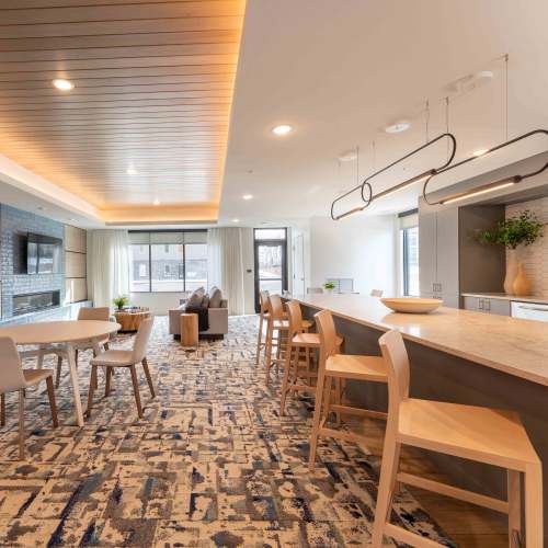 Kitchen with an island at The Ellie in Eden Prairie, Minnesota