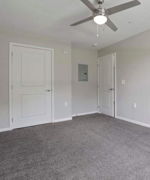 Beautiful bedroom with carpet flooring at Wheatland Crossing II in Columbus, Ohio