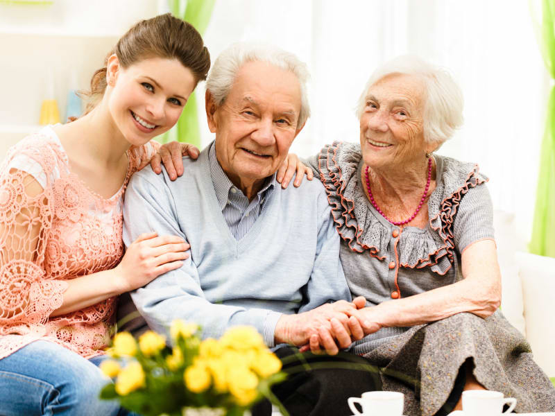 Two respite care residents and their daughter at Bell Tower Residence Assisted Living in Merrill, Wisconsin