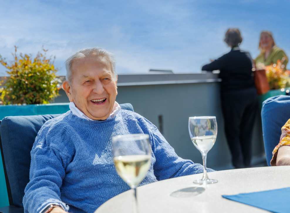 Resident man laughing at Murano in Seattle, Washington