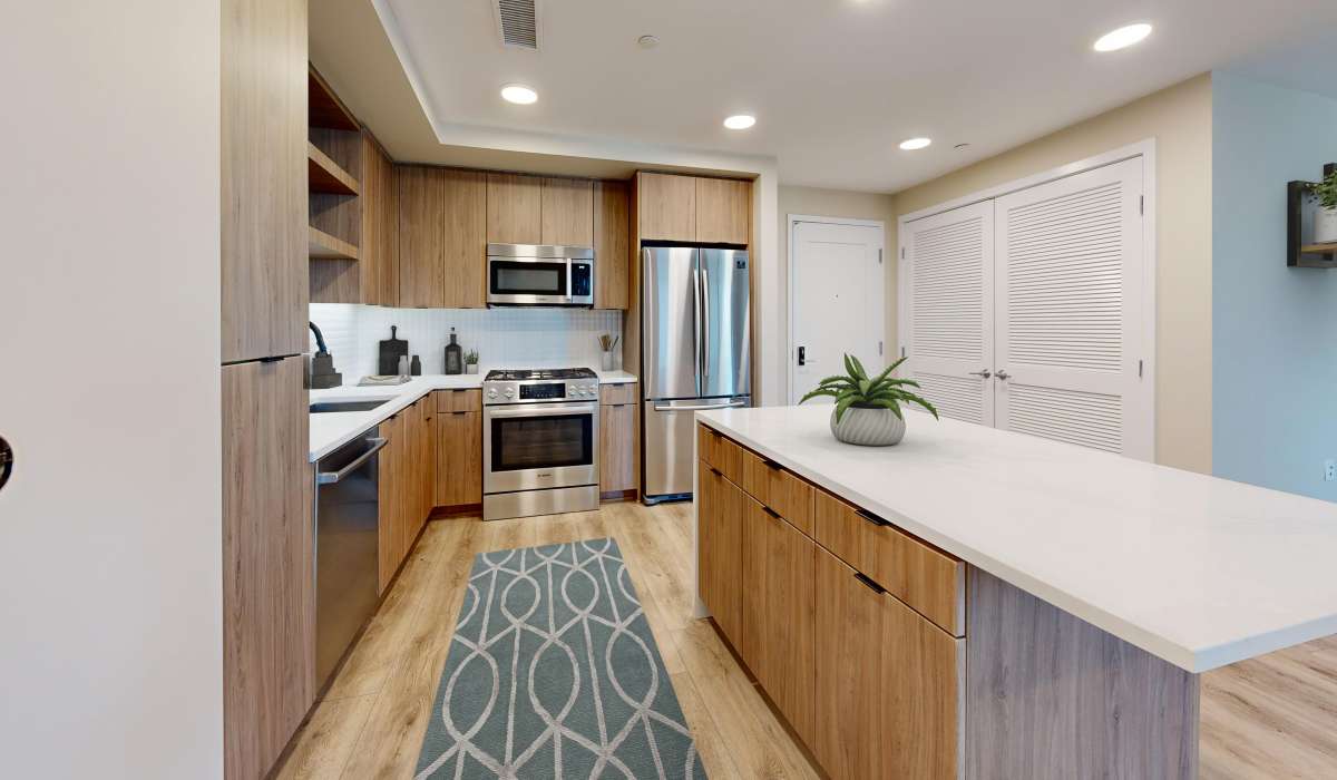 Kitchen with stainless-steel appliances at Prado West in Dana Point,California