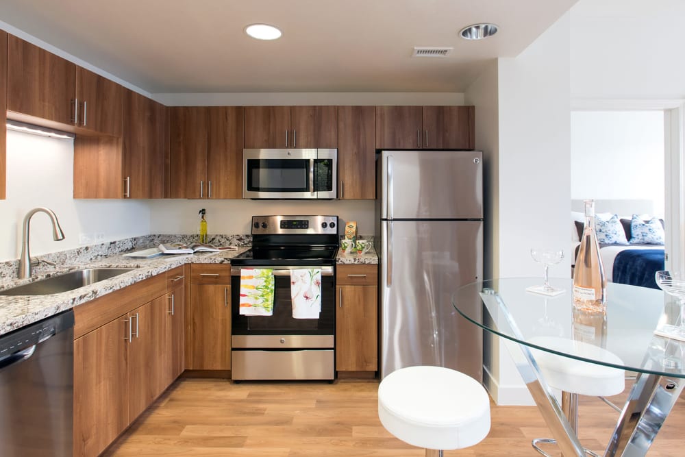 Kitchen with stainless steel appliances at 1010 Pacific 