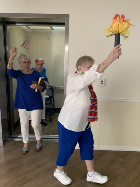 Barkley Place residents held the torch high and proud during each leg of the passing of the torch ceremony.