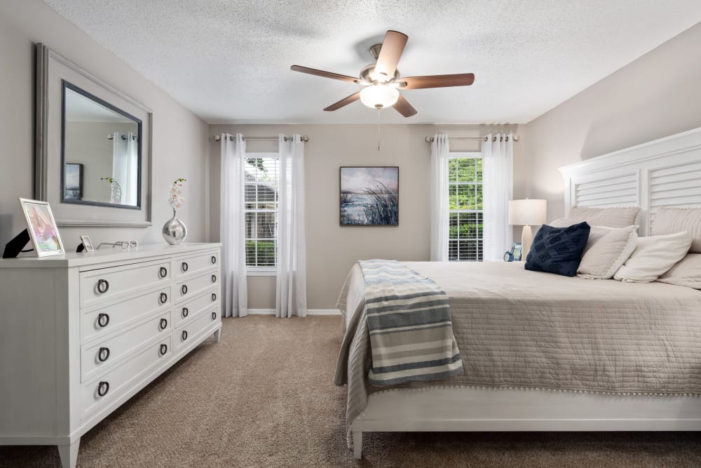 Plush carpeting in a spacious apartment bathroom at Arbor Gates in Fairhope, Alabama