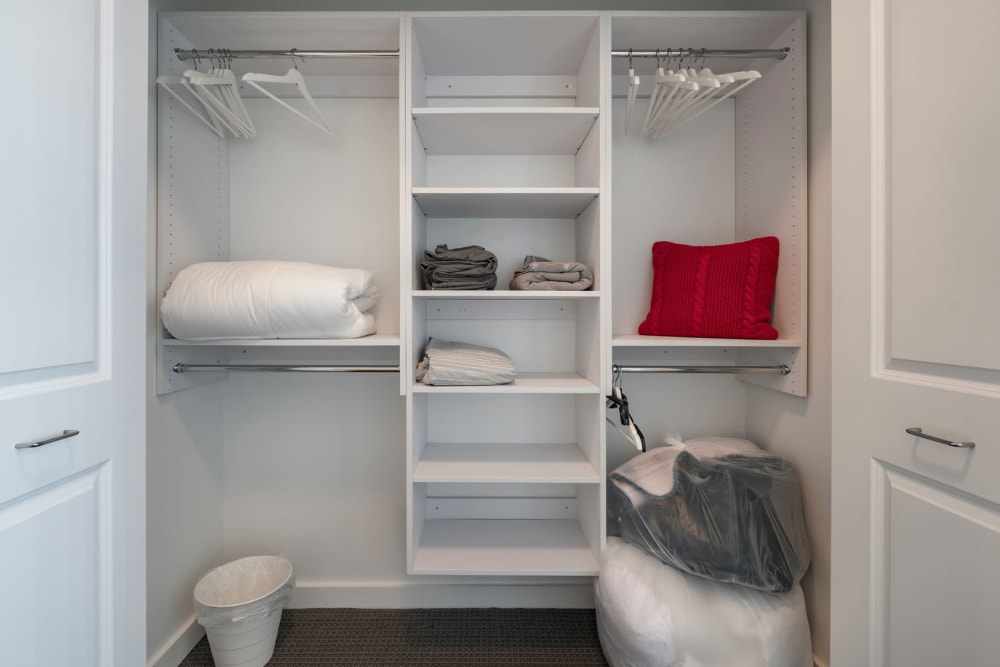 Custom shelving in a model home's walk-in closet at CitiTower in Orlando, Florida