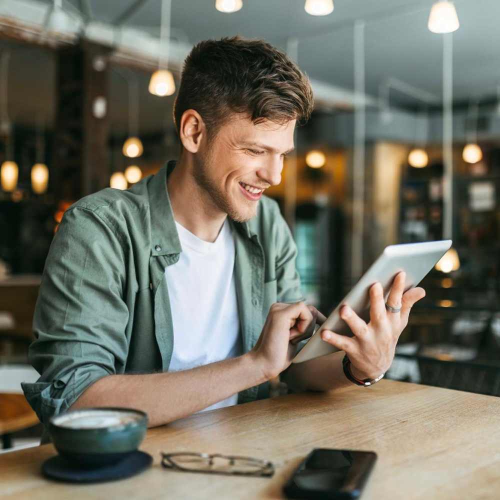 Resident using tab at Palomar Woods in Lexington, Kentucky