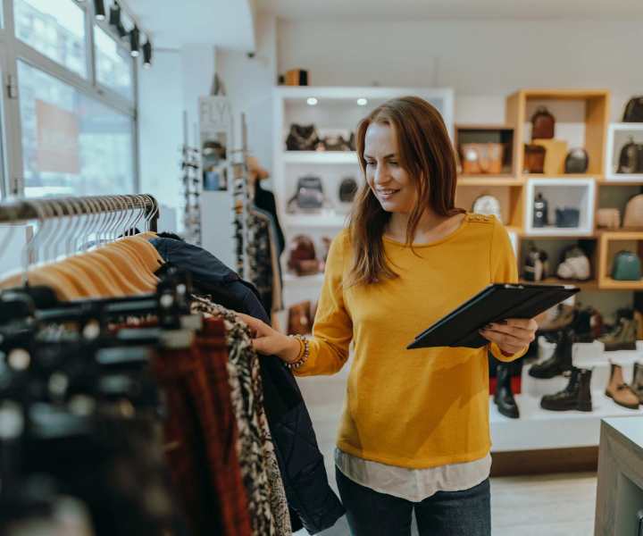 Resident shopping at a clothing boutique near Historic Boylan Apartments in Raleigh, North Carolina