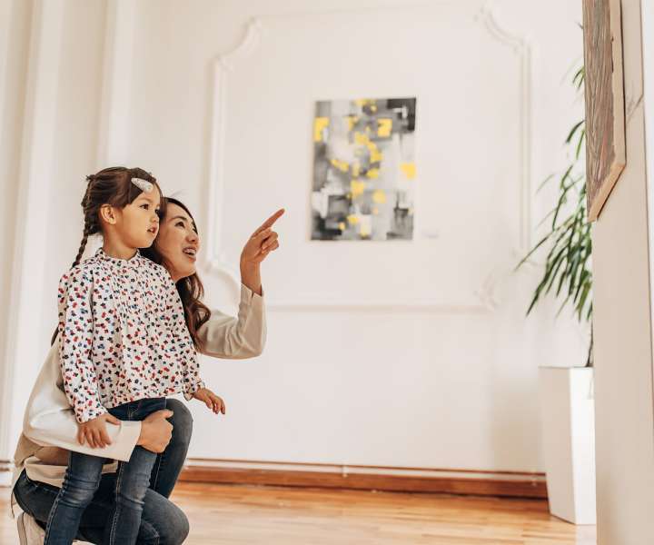 Mother and daughter exploring a museum close to Pittsford Village Estates in Pittsford, New York