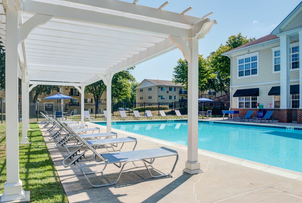 Ping pong table and foosball by the swimming pool at Stonegate at Devon Apartments in Devon, Pennsylvania