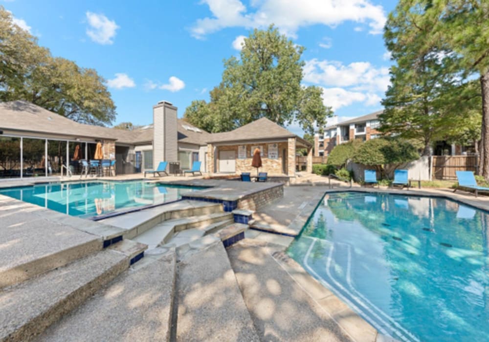 Outdoor pools at Ronan Apartment Homes in Grand Prairie, Texas